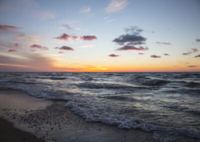 photo of the shoreline at sunset