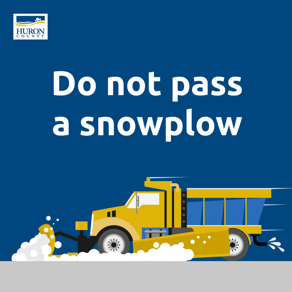 A snowplow graphic with text that says do not pass a snowplow